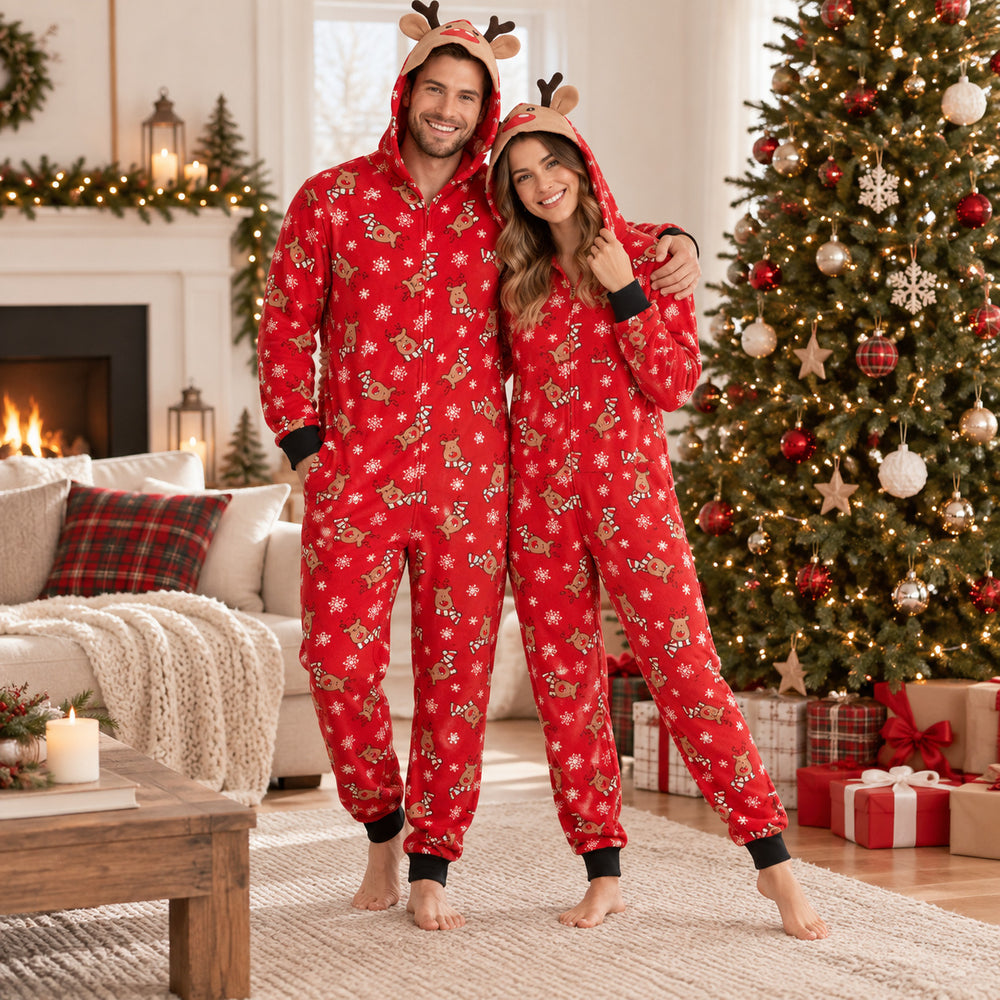 Couple en pyjamas combinaisons de Noël rouges assortis